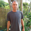 Load image into Gallery viewer, Male model wears a Charcoal short sleeve crew neck T-shirt