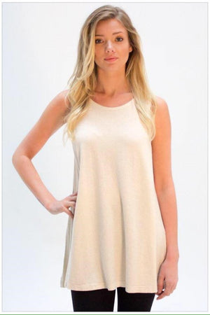 Our flowy and super relaxed fit natural tank top comes in a tunic length and is perfect over leggings and tights. Made ethically in Vancouver BC with organic cotton and hemp. 
