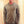 Load image into Gallery viewer, A fit young man wears a mushroom coloured hooded long sleeve pullover top. The hood is down.
